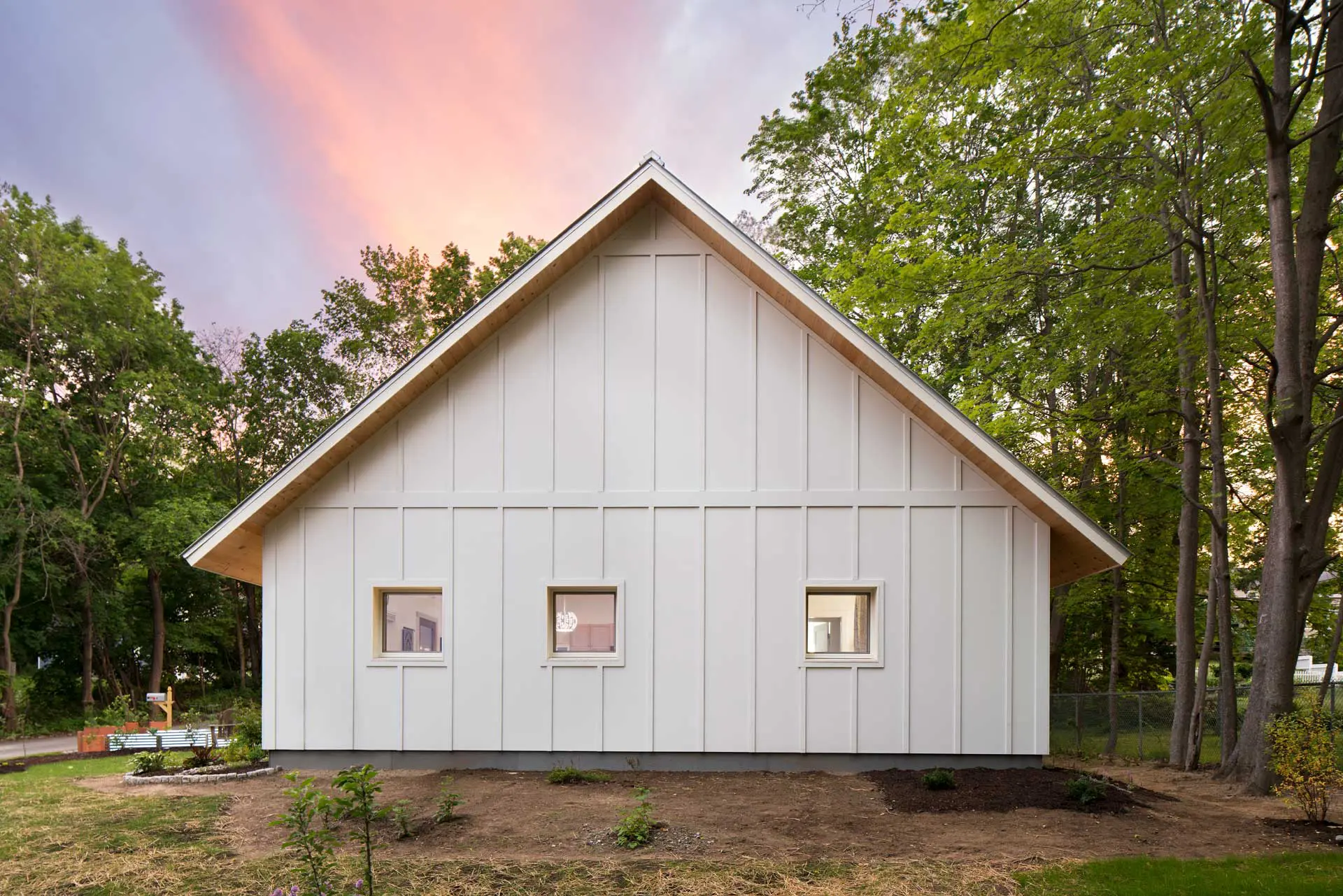 House with white exterior, Ecocor Passive House Goldenrod Morse Court