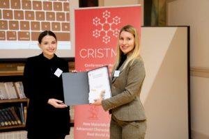 Natalie Fijol receiving a poster prize