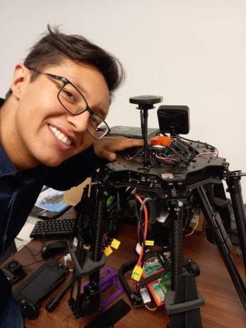 Esteban with drone in office