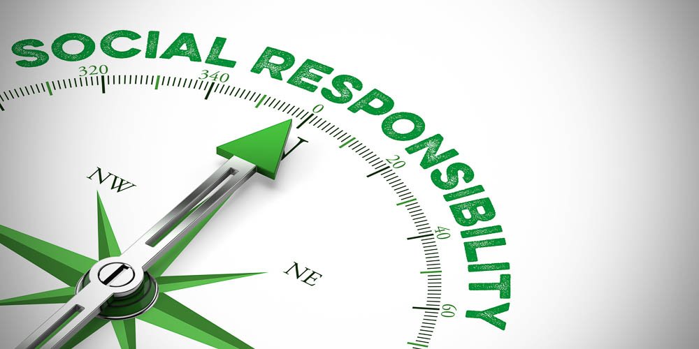 A compass with the needle pointing to the words "SOCIAL RESPONSIBILITY" in green serves as a powerful reminder of how sustainable tourism can align actions with social values and ethics. The white background focuses attention on the compass’s message of responsibility and certification.