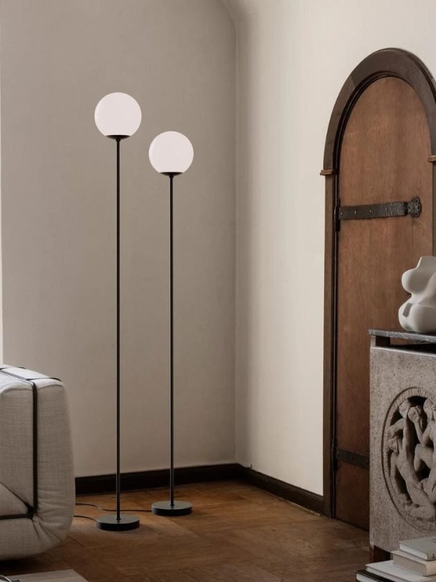 Ethically made black floor lamps with white sphere 