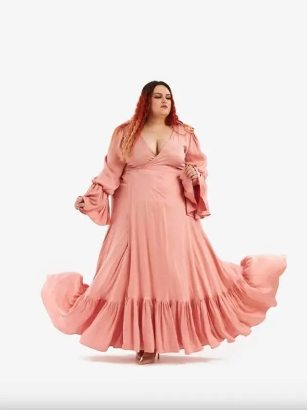 model wearing pink flowy dress