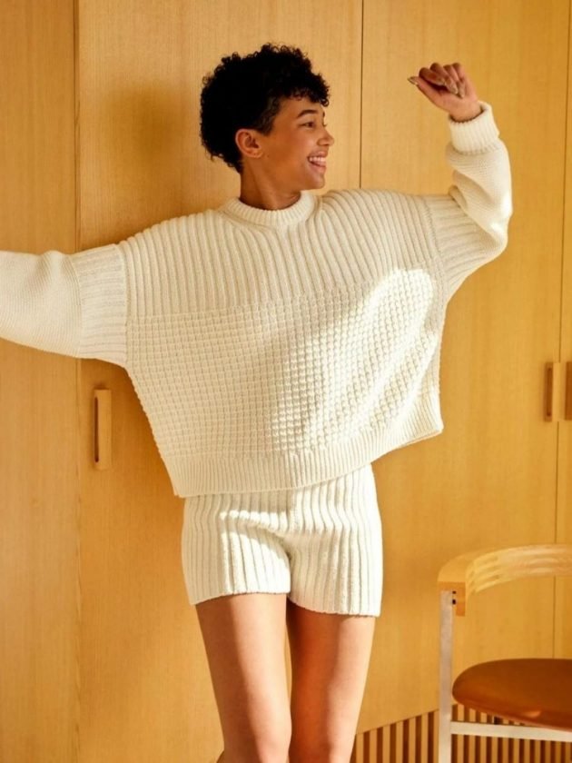 woman wearing cream sweater - slow fashion from Made Trade