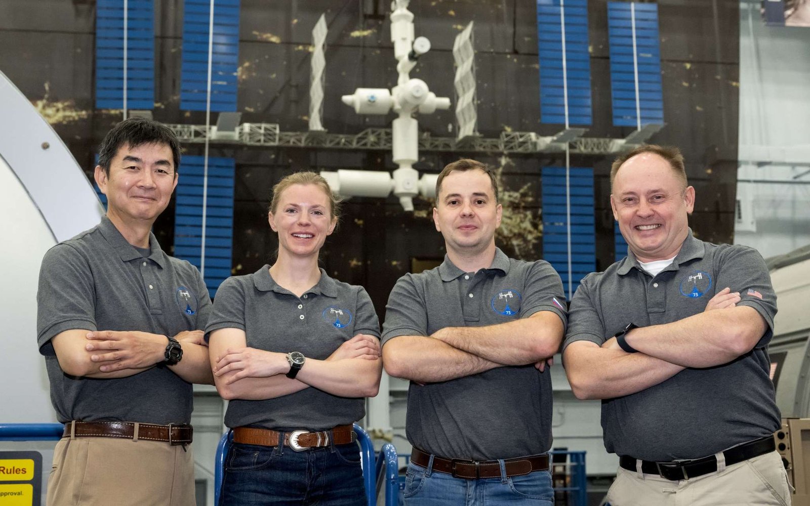 NASA’s SpaceX Crew-11 members stand inside the Space Vehicle Mockup Facility at the agency’s Johnson Space Center in Houston. From left are Mission Specialist Kimiya Yui from JAXA (Japan Aerospace Exploration Agency), Commander NASA astronaut Zena Cardman, Mission Specialist Oleg Platonov of Roscosmos, and Pilot NASA astronaut Mike Fincke.