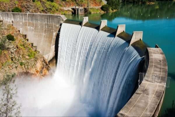 water coming out of a dam