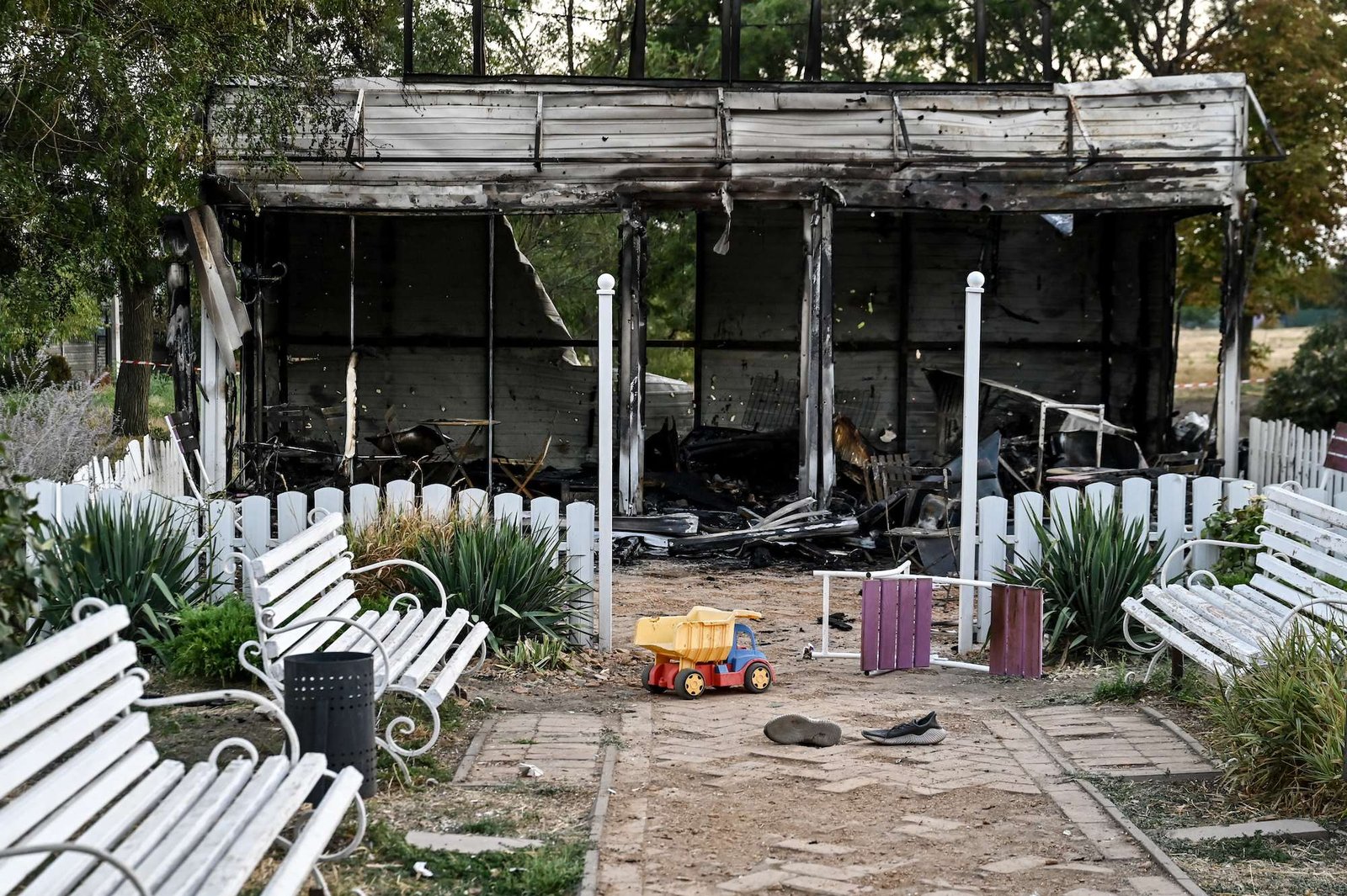 A toy truck is seen outside a children's cafe damaged by a Russian artillery shell strike in Malokaterynivka village, Zaporizhzhia region, southeastern Ukraine, on August 20, 2024.