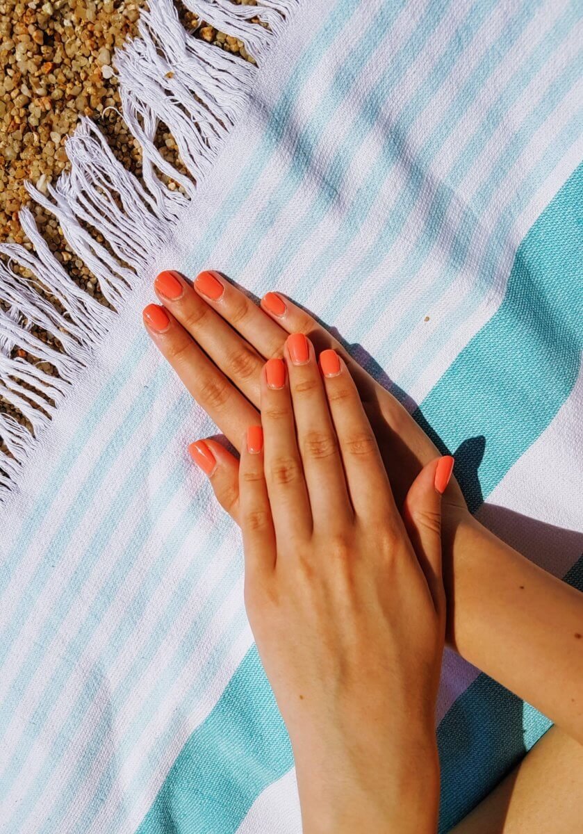 painted nails on top of blanket