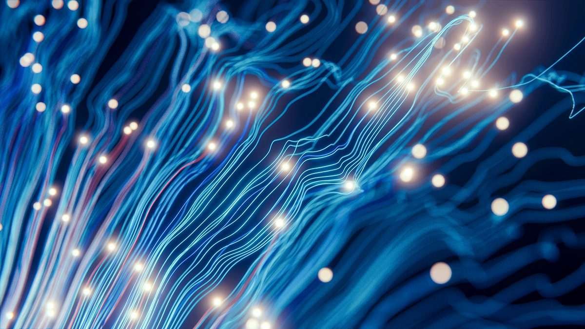 Abstract arrangement of light and dark blue lines of varying shades, with pinpoints of bright white light scattered throughout the image, the whole being suggestive of electricity