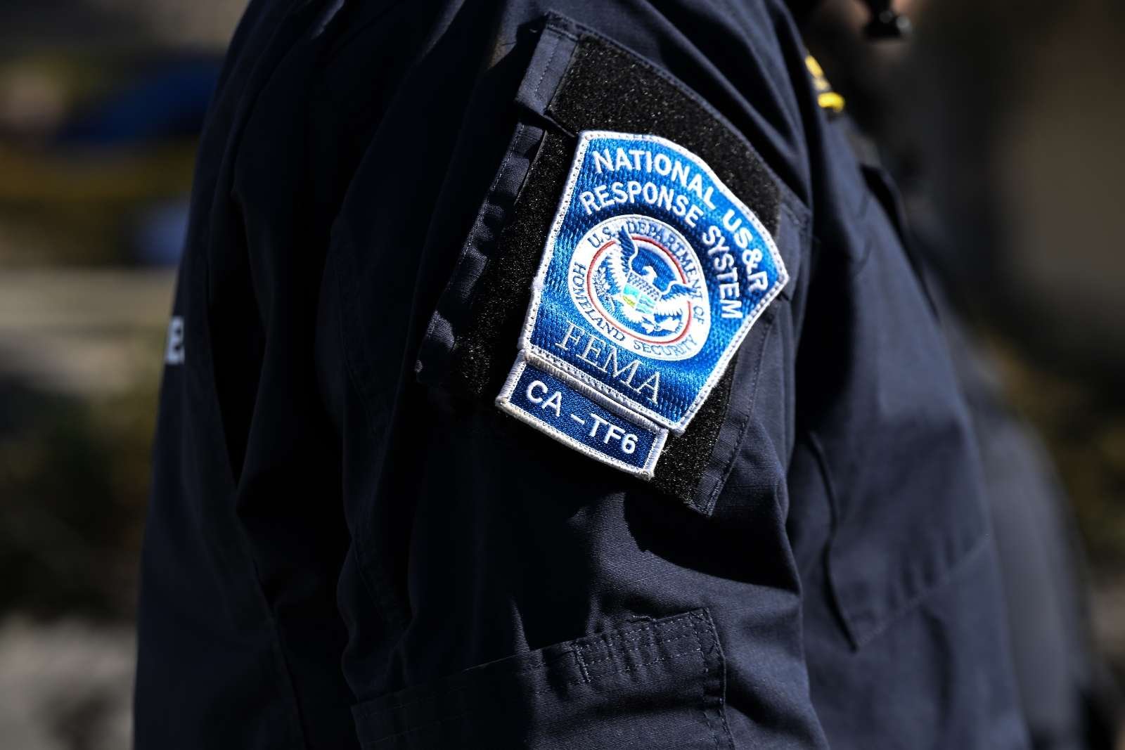 Closeup of a FEMA patch on an officer's jacket