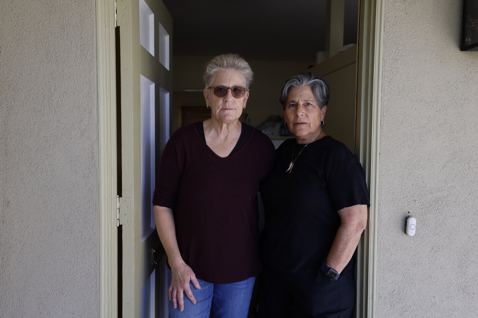 Ria Cousineau and her partner Emily. Ria lost her home in the Eaton fire, while Emily's was damaged. After a difficult search, they were able to find a place to rent nearby. Photo taken in in Pasadena Tuesday, Jan. 21, 2025.