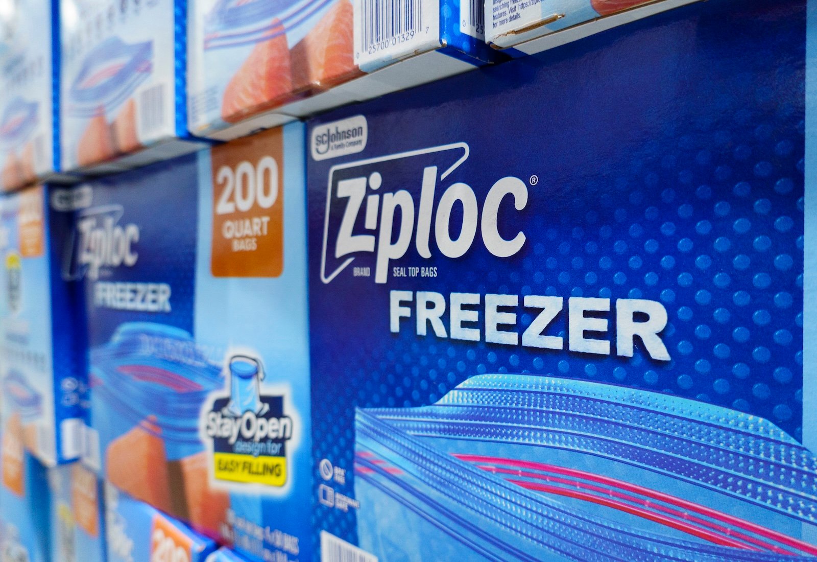 Boxes of Ziploc-brand freezer bags lining a grocery store shelf
