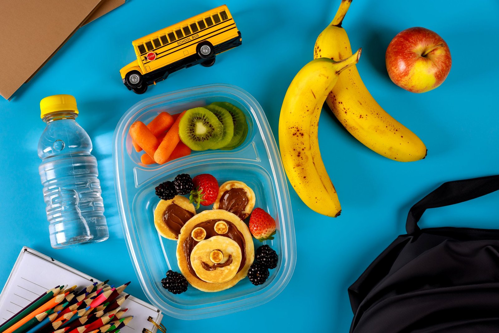 school-lunch-box-with-pancakes-vegetables-and-fru-2025-01-09-18-44-12-utc