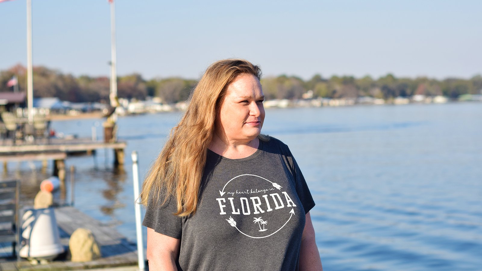 Clay County resident Christy Carter stands near a lake in North Florida.