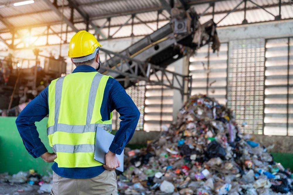A worker in a recycling facility.