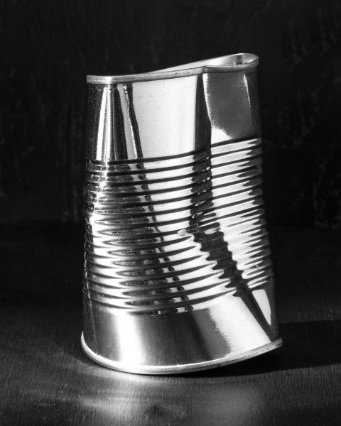 Partly crushed tin food can