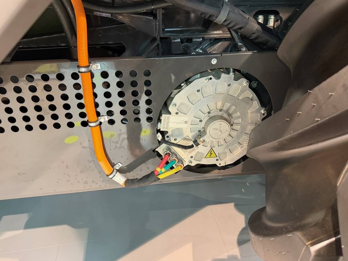 Zoomlion’s electric drive for the auger is one of several electric motors on a concept combine shown at Agritechnica 2025. Photo: John Greig