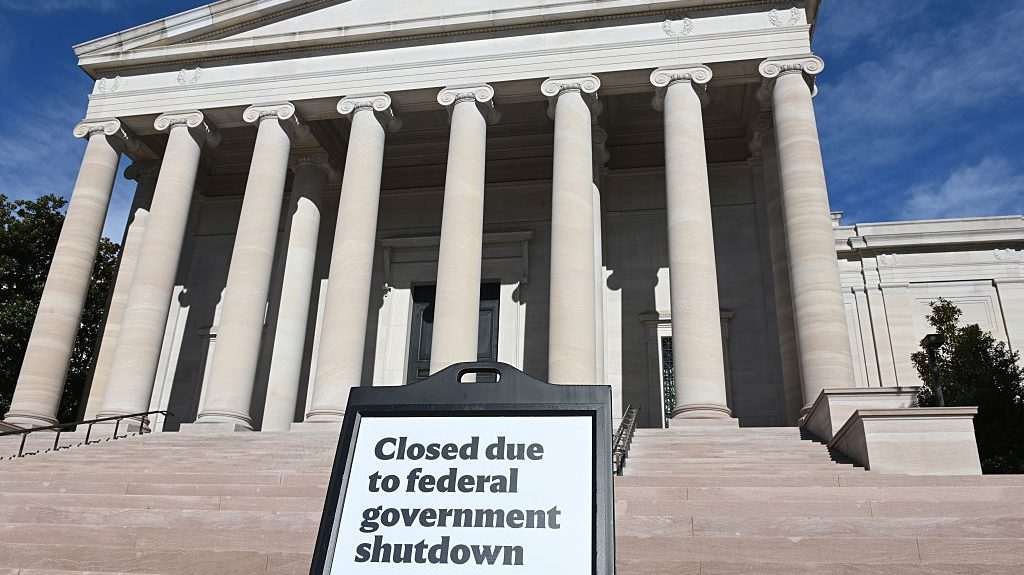 Front of the National Gallery of Art with sign that it is closed due to federal shutdown.