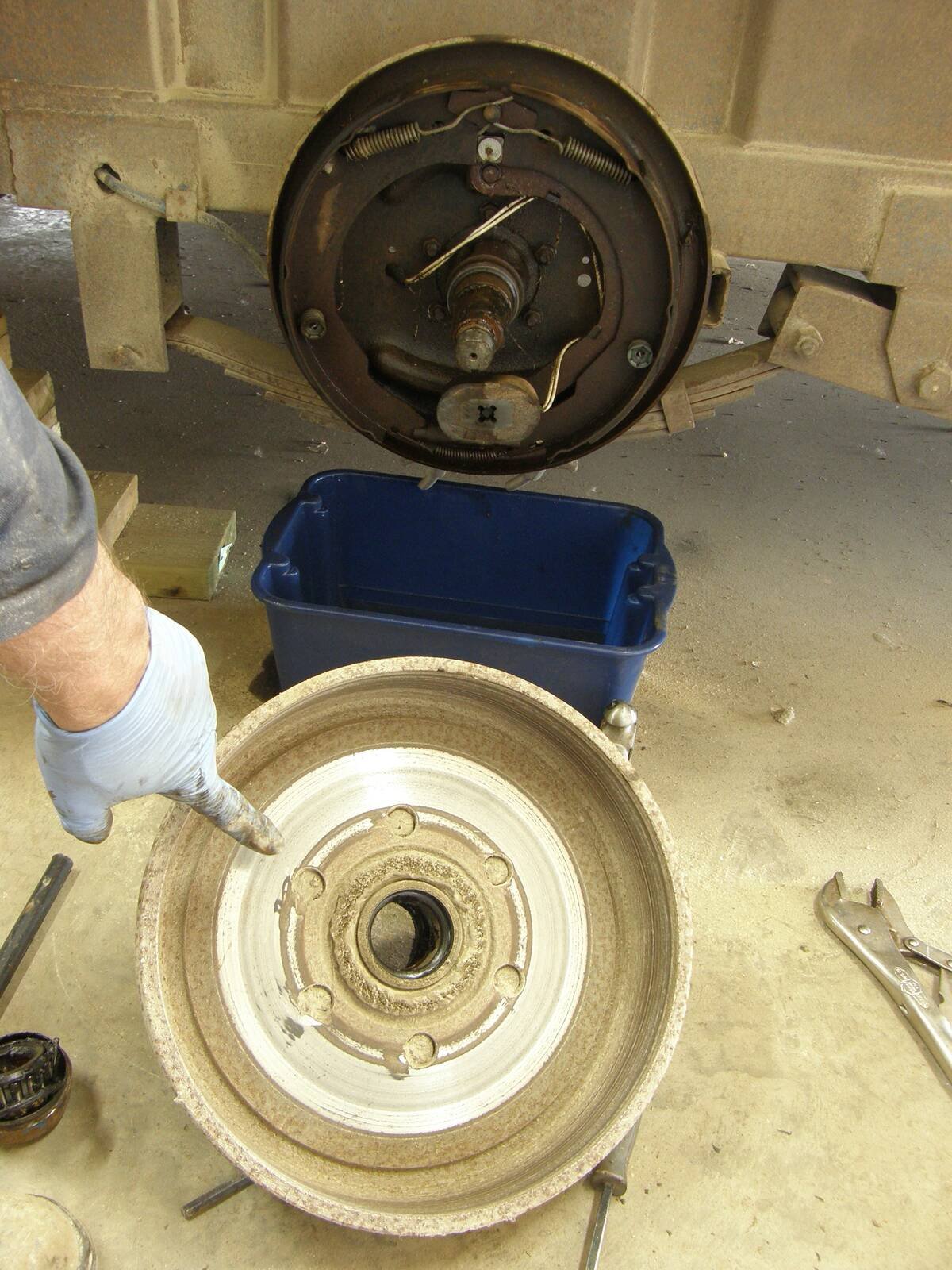 When you’ve removed the drum to inspect the brakes, be sure to inspect the inside of the drum to see that the wear surfaces where the magnet and shoes contact it are smooth, without excessive wear.