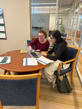Paige Goff meets with a colleague at Domtar's headquarters in Fort Mill, South Carolina.