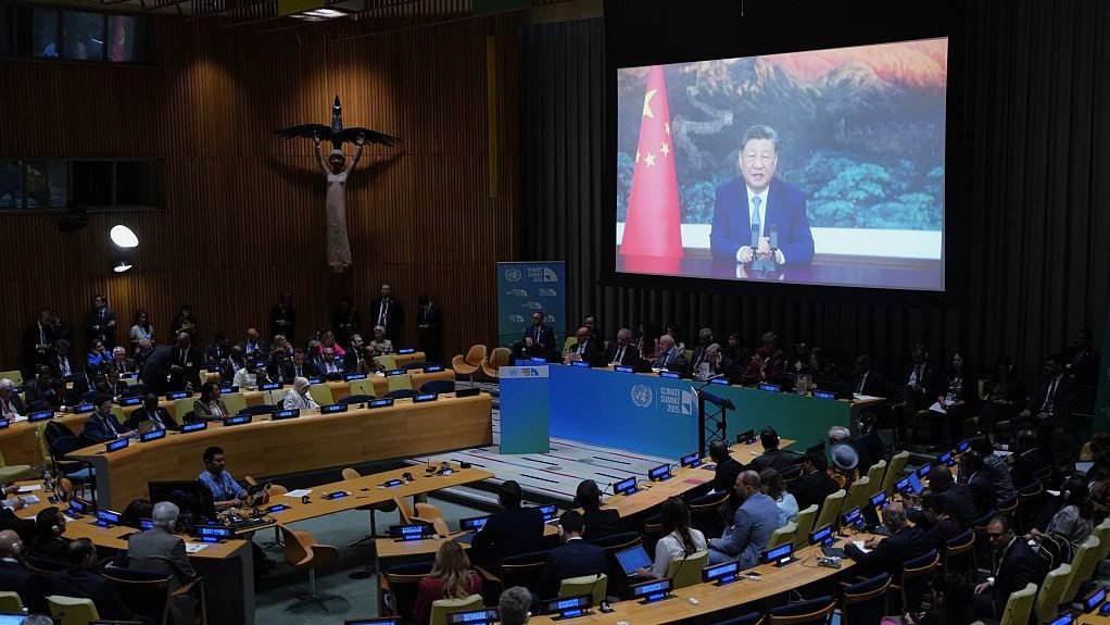 Presiden Xi Jinping on a giant screen in United Nations meeting room