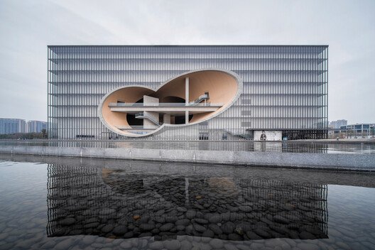 Shanghai poly grand theatre by Tadao Ando. Image © nj.ap via Shutterstock