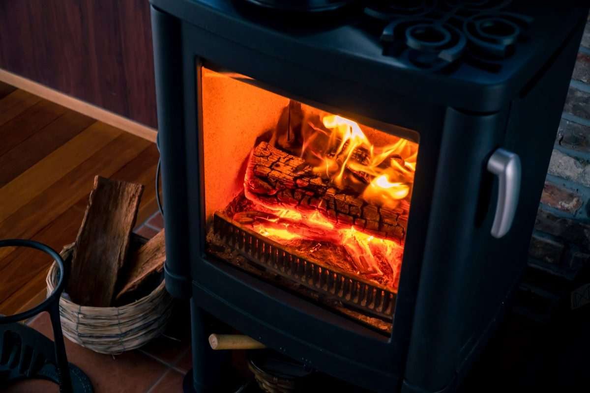 A wood burning stove in a home setting