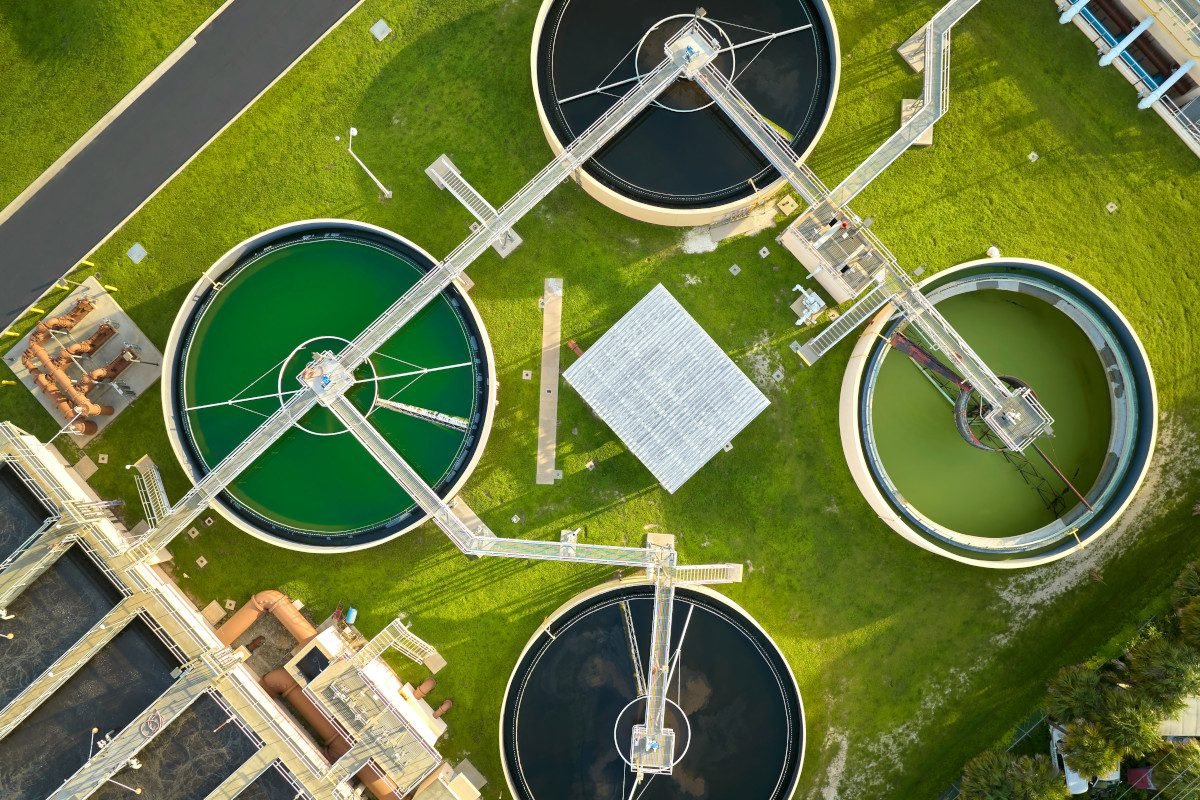 Aerial view of circular clarification tanks at a water treatment plant