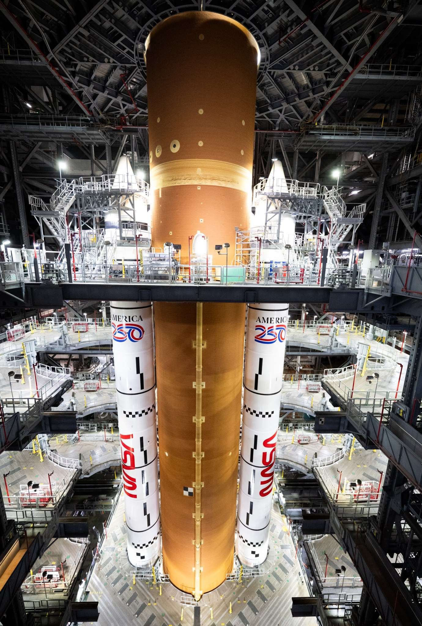 Photo of NASA's SLS (Space Launch System) rocket inside the Vehicle Assembly Building at Kennedy Space Center.