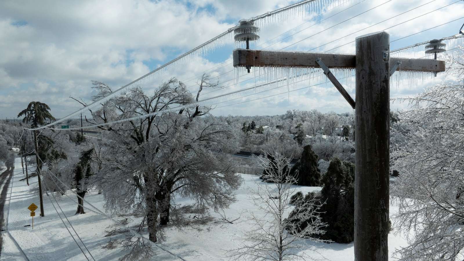 Ice accumulates on utility lines in Nashville, Tennessee, during Winter Storm Fern. The storm knocked out power to at least 300,000 people across the South.