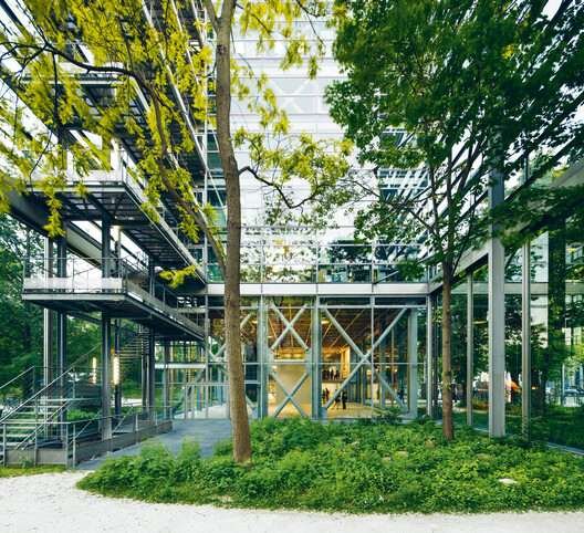 Openness and flow imparted by the transparency between the city, the sky, the surrounding garden, and the building itself inspires a consciousness of nature in the visitors of the Fondation Cartier, Boulevard Raspail.. Image © 2025 Jean Nouvel/Artists Rights Society (ARS), New York/ADAGP, Paris, Photo ©Luc Boegly