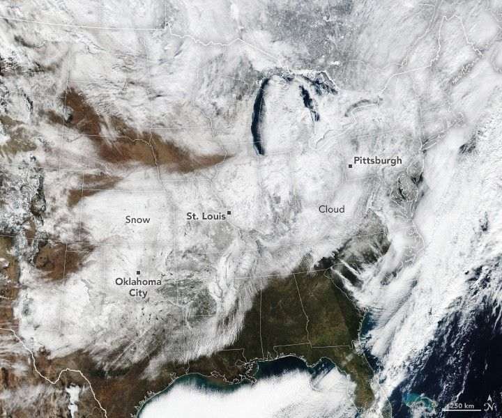 Much of the central, Midwest, and northeast United States is covered in a layer of white snow.