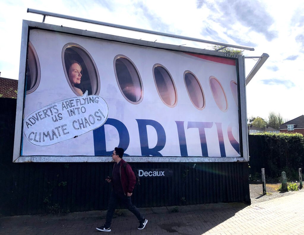 a subvertising billboard as part of the week of action against airline advertising