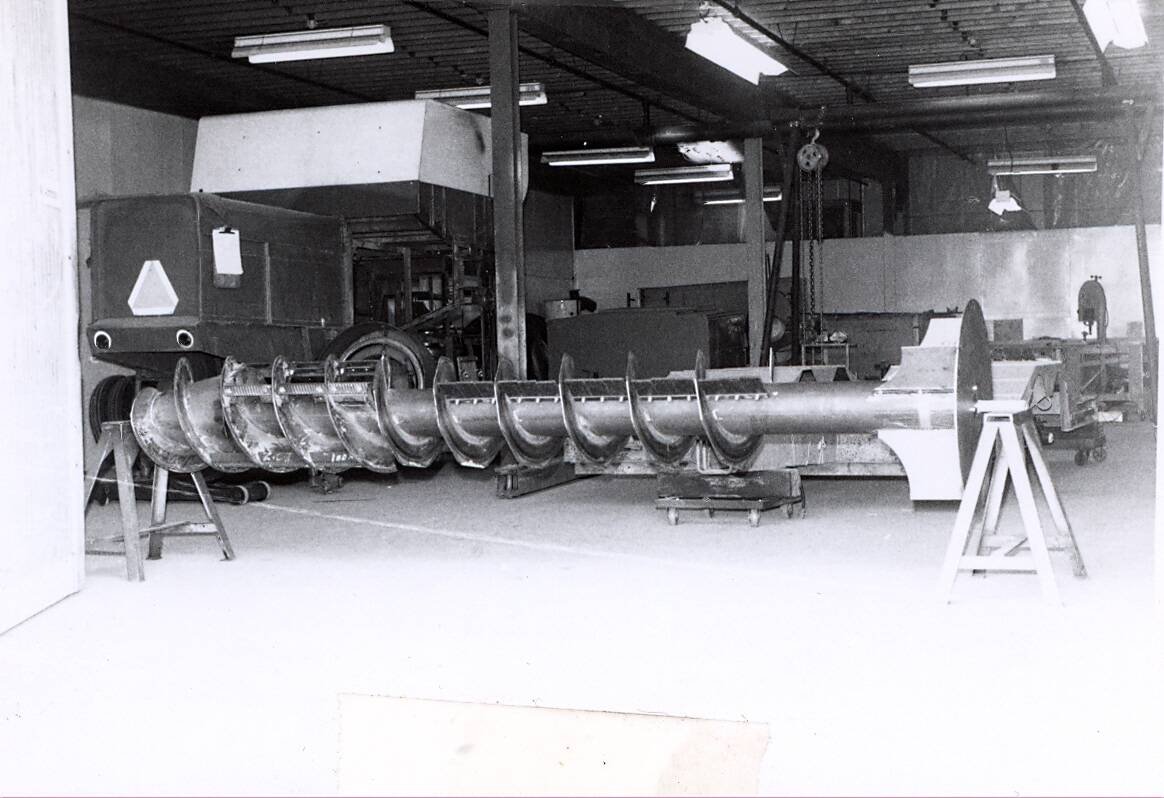 The thresher, separator and auger assembly of the R2A prototype, which was also built on the chassis of a conventional Cockshutt 535 and field tested in the 1968 growing season.