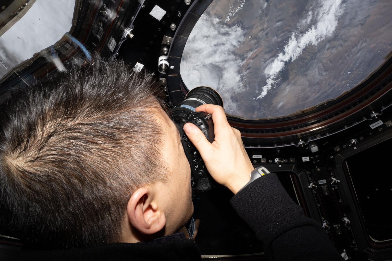 NASA astronaut Jonny Kim takes a photo of Earth landmarks from the International Space Station's cupola. Credit: NASA.