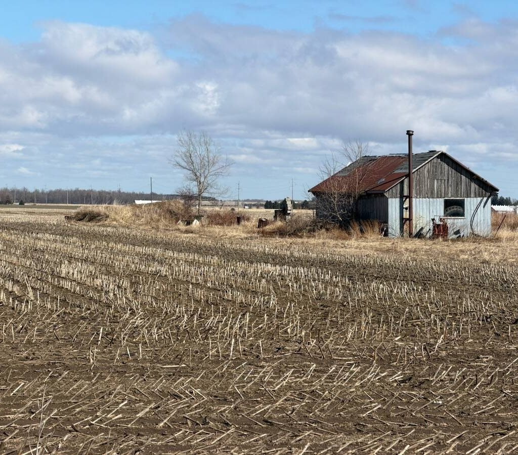 Astronaut Jeremy Hansen's home farm with building.