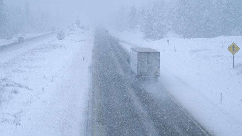 truck-snowy-highway-holiday-safety