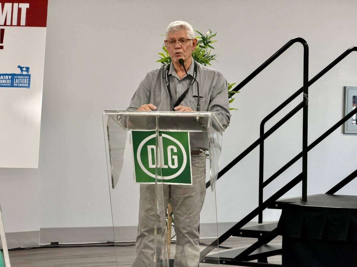 Ontario dairy farmer Paul MacLeod speaking at the Canadian Dairy Business Summit 2026. Photo: John Greig.