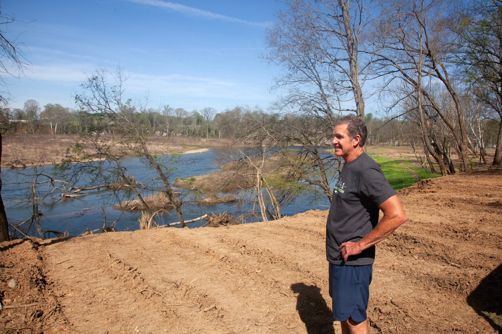Farmer Will Runion overlooks his fields next to the Nolichucky River.