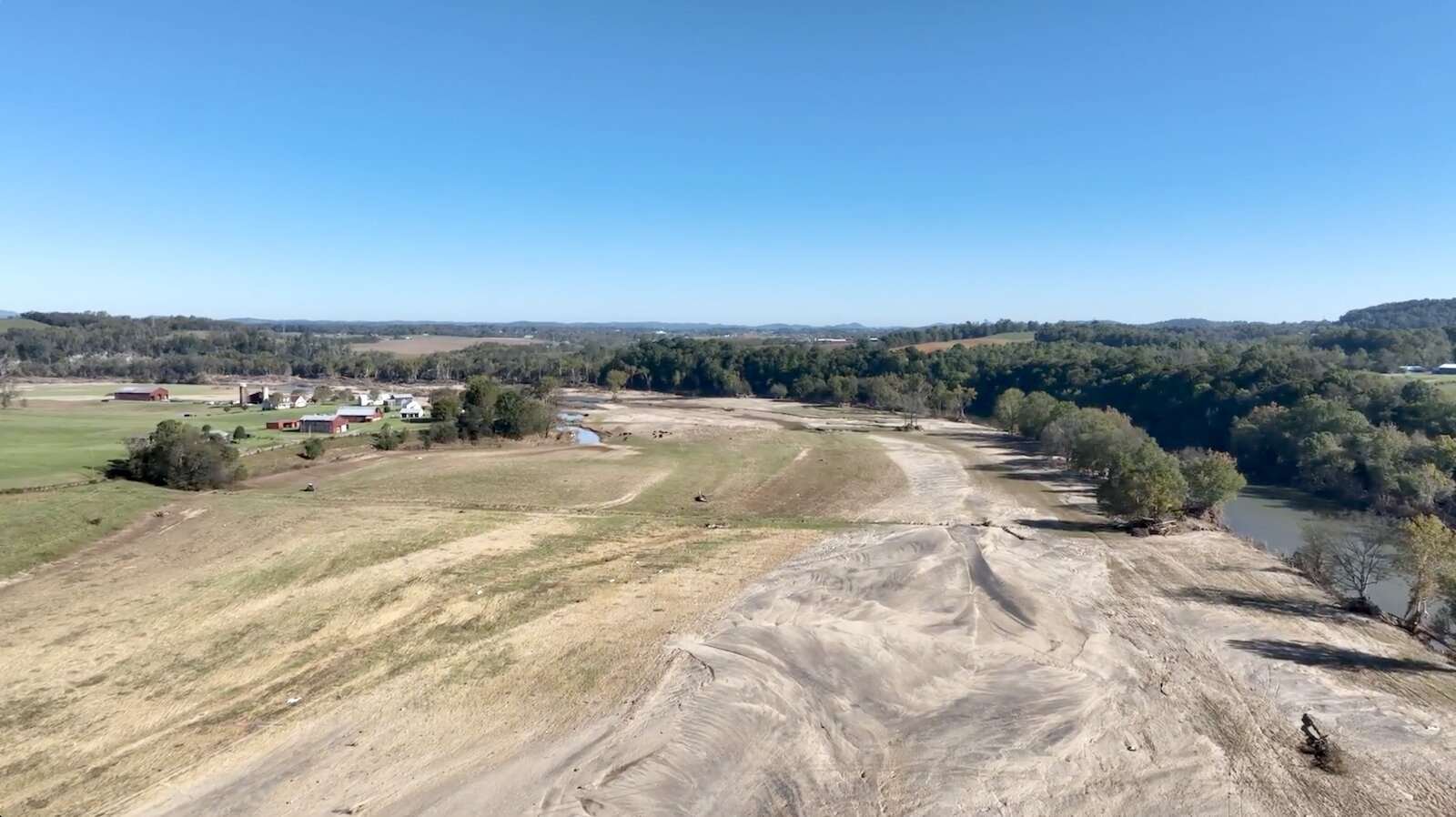 washed up sand from a storm near farmland