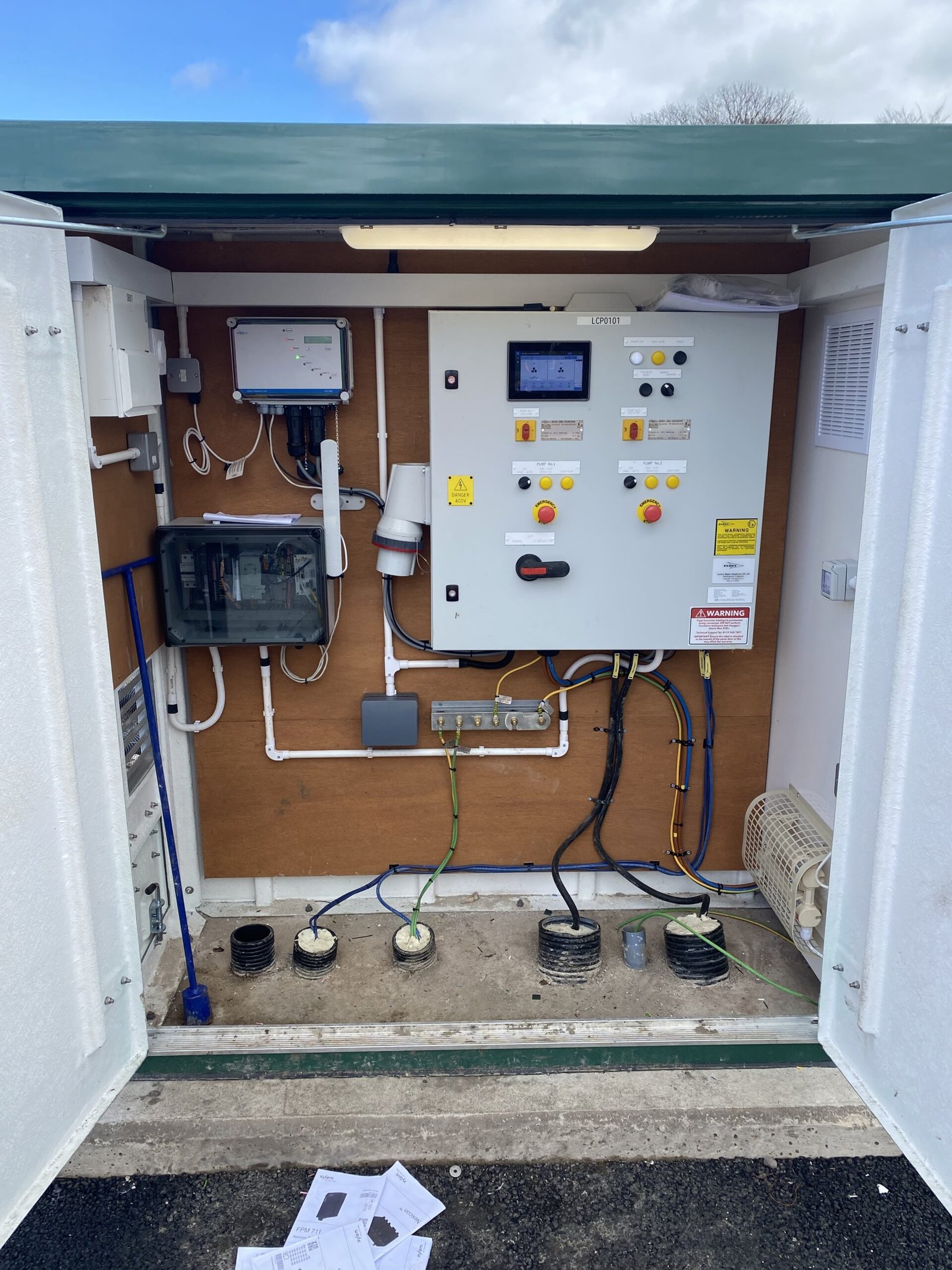 Enclosure containing control and monitoring equipment