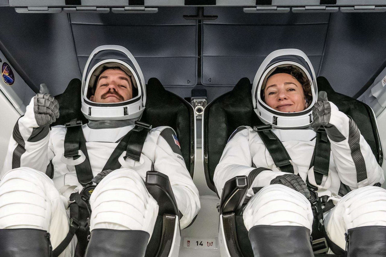 NASA astronauts (from left) Jack Hathaway and Jessica Meir, SpaceX Crew-12 Pilot and Commander respectively, are photographed in their pressure suits and inside the Dragon spacecraft during the Crew Equipment Interface Test at NASA’s Kennedy Space Center in Florida. The goal of the training is to rehearse launch day activities and get a close look at the spacecraft that will take them to the International Space Station.