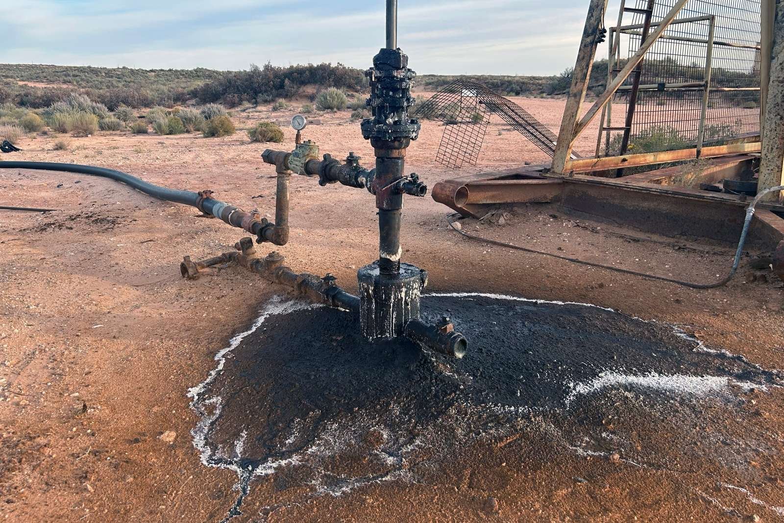 Aerial shot of oil and wastewater leaking from a well in New Mexico’s Permian Basin