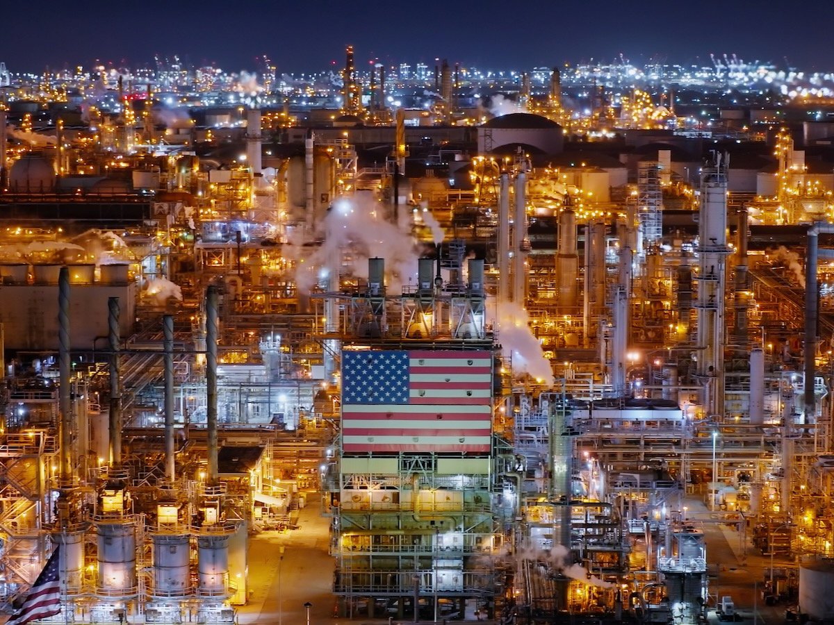 Aerial view of an oil refinery in Wilmington, a neighborhood in the South Bay and Harbor region of Los Angeles, California, on a clear night.