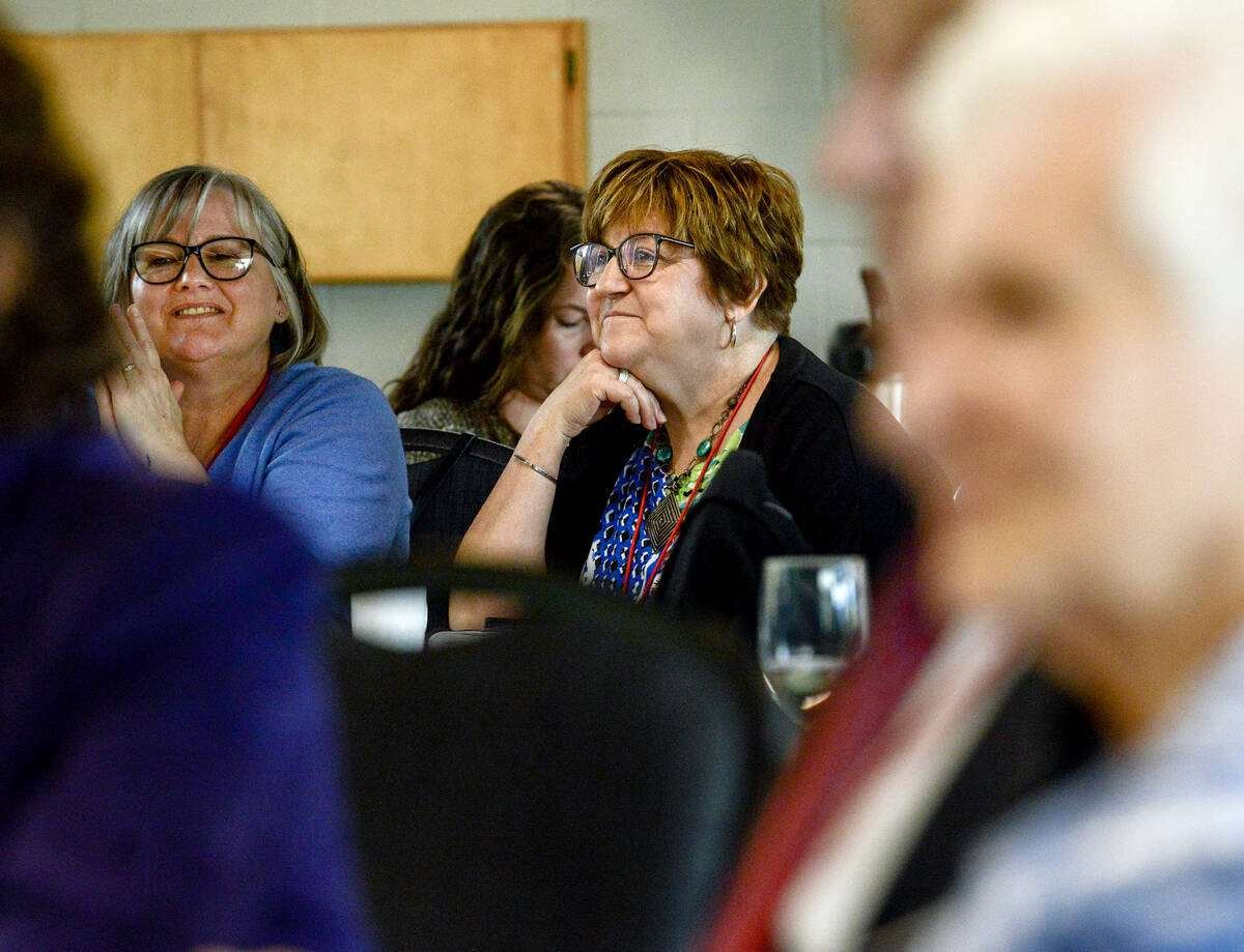 Attendees at AgScape’s 35th anniversary annual general meeting listen earnestly as lifetime members share their memories of the organization’s early days. Photo: Diana Martin