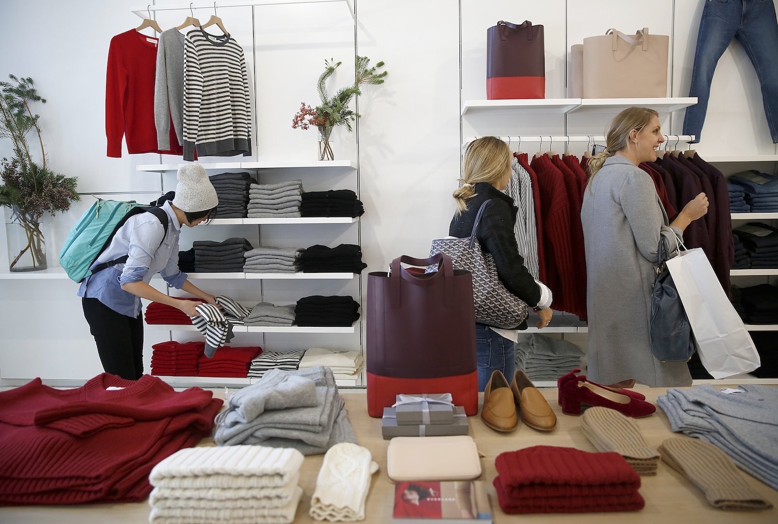 Women browse the clothes at Everlane's store in San Francisco.