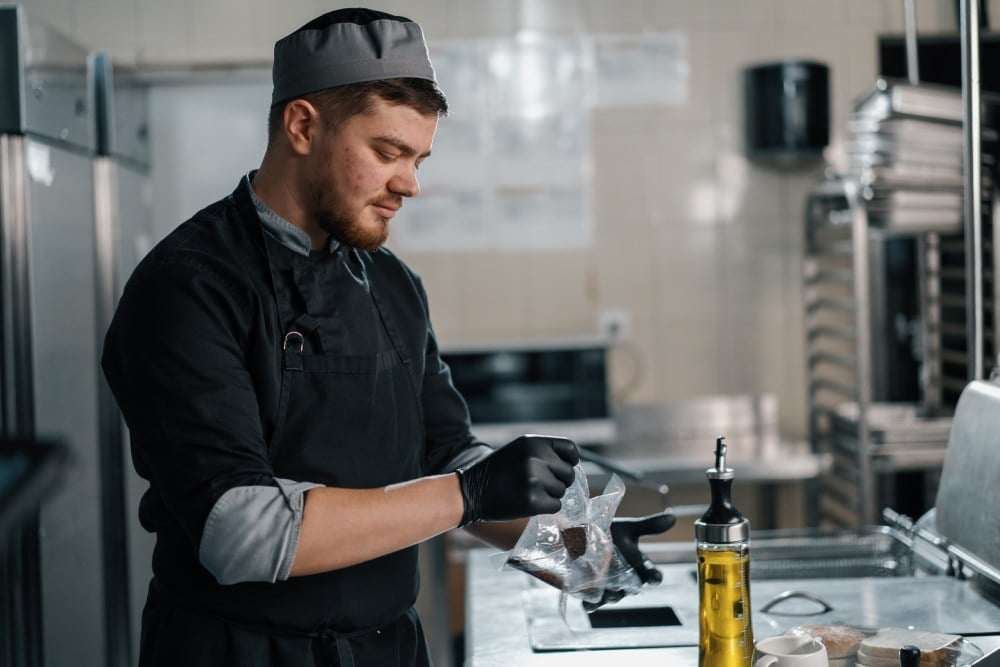 Chef in a hotel restaurant kitchen.