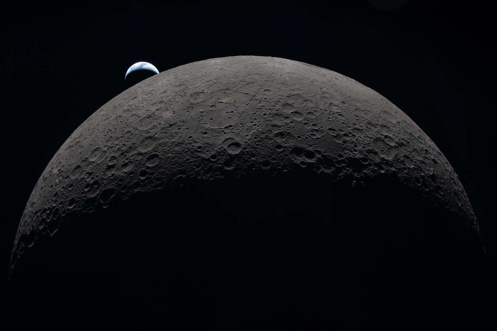 Picture from Artemis II, Earth in the distance behind the moon.