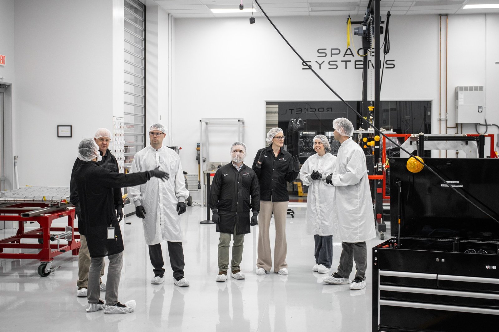 Members of NASA’s Cryogenic Fluid Management project tour Rocket Lab’s Spacecraft Production Complex in Long Beach, California, on Thursday, Feb. 12, 2026 . The portfolio project team had the opportunity to view the LOXSAT payload and the setup for vibration testing. Credit