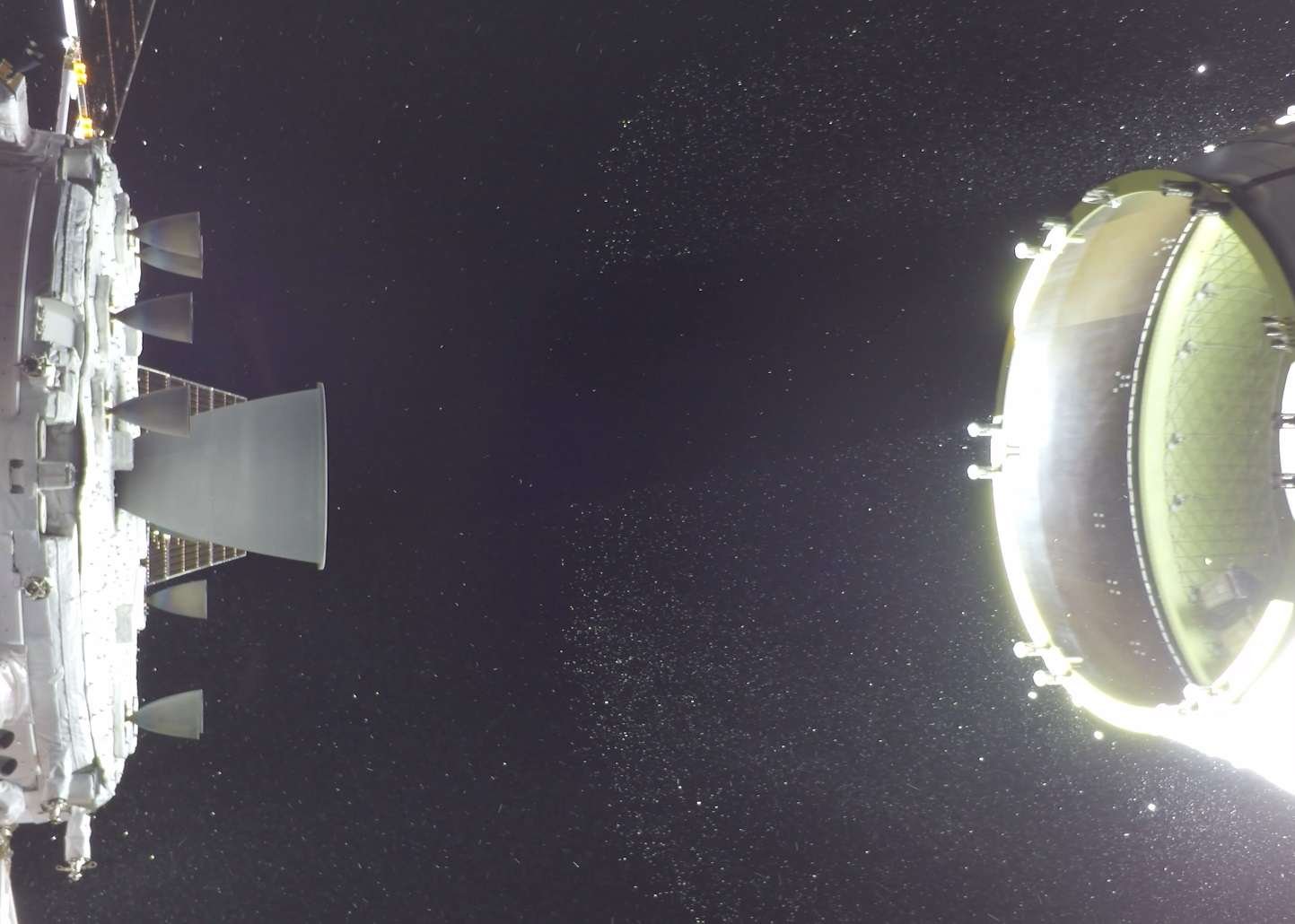 Two of the Artemis II CubeSats can be seen in the lower portion of the Orion stage adapter on the right side of the image.