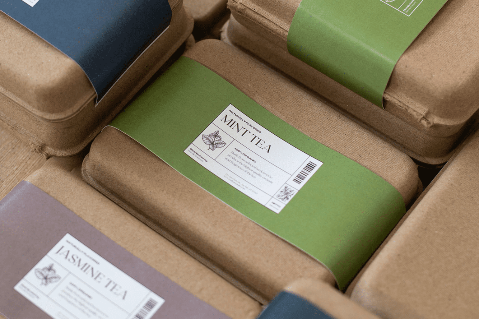 Molded pulp packaging with wrap around branded sleeves